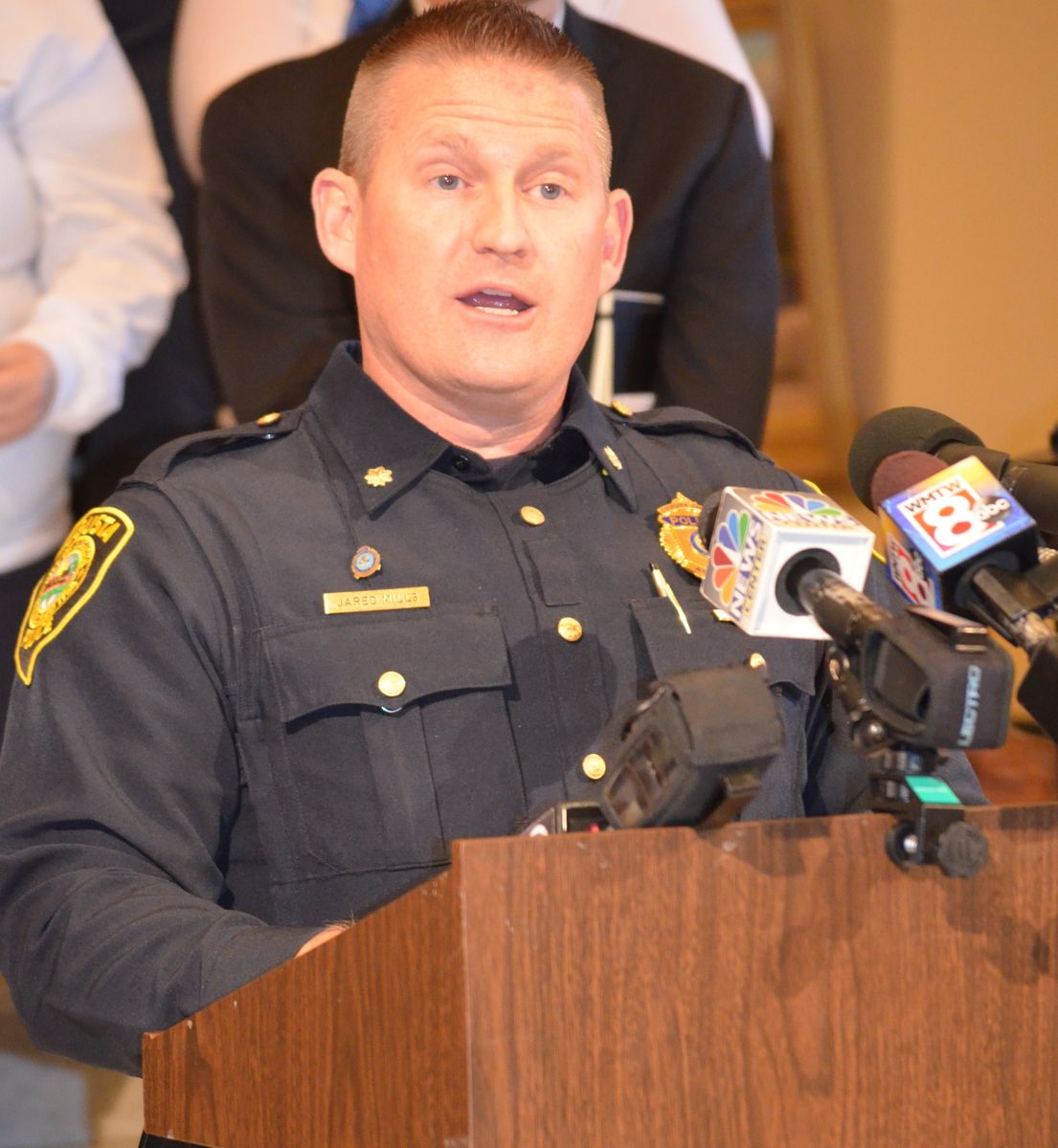 Augusta Maine Police Chief Jared Mills speaks at the state capitol