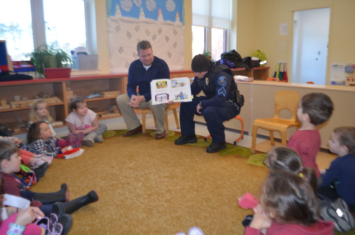 School Resource Officer Sgt. Heidi Johnston and Maine State Rep. Nathan Wadsworth read to students of the Fryeburg Head Start and the Molly Ockett Elementary School PreK.